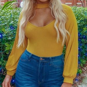 . Shop Hope’s Honey Gold Long Sleeve Ribbed Cut Out Bodysuit